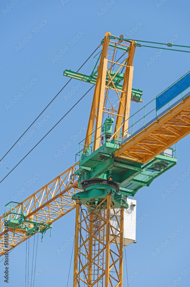 Construction tower crane with a cabin