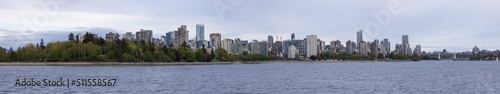 Modern City, Stanley Park, Buildings, beach and Burrard Bridge in False Creek on the West Coast of Pacific Ocean. Downtown Vancouver, British Columbia, Canada. Panoramic View