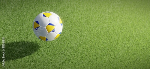 Football or soccer ball design with flag of Bosnia and Herzegovina against grass pitch backdrop. 3D rendering