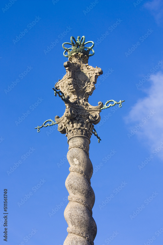 Carved shameful stone pillory for punishment on the square near the Porto Cathedral (Cathedral Se) in Porto, Portugal