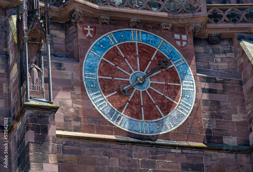The old tower clock on the Freiburg Minster has only one clock hand and doesn‘t know the minutes. Baden-Wuerttemberg, Germany, Europe