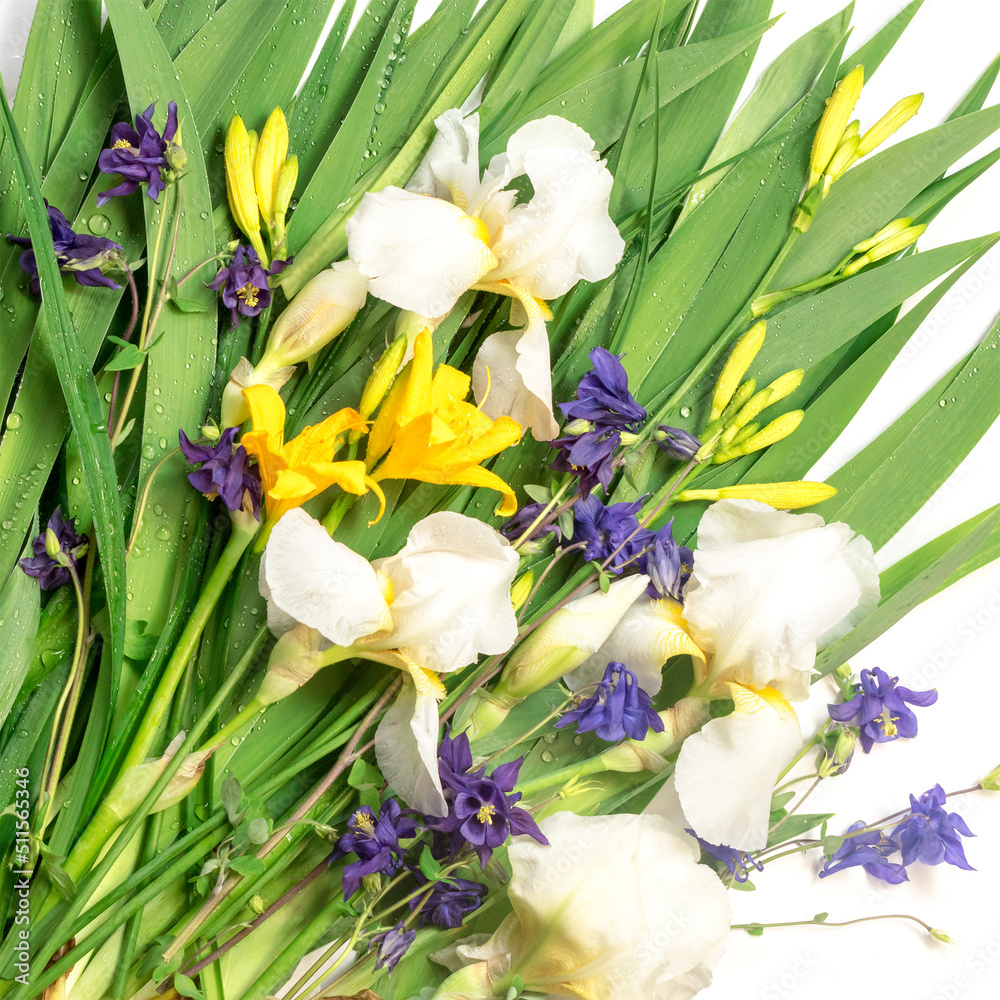 Fresh green leaves , yellow lily buds,white iris flowers,blue bells and dew drops.Beautiful natural background