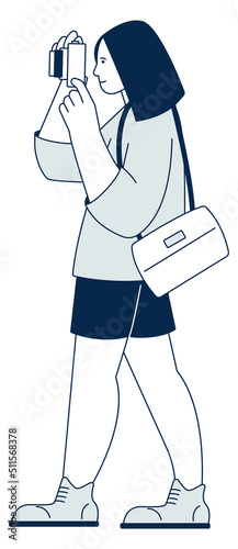 Female tourist with photo camera. Sightseeing person on vacation
