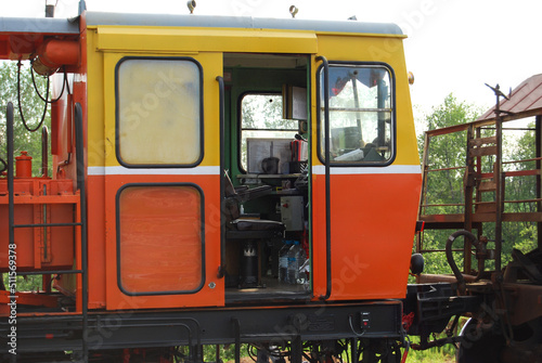 The driver's cabin of the rail stacker. Rails, sleepers, railway construction. Rail-laying machine.