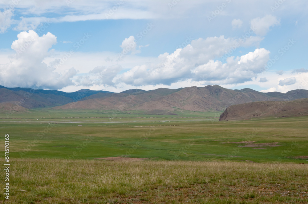 Awesome landscape in Central Mongolia. In the distance, ger or yurta, traditional mongolian tents