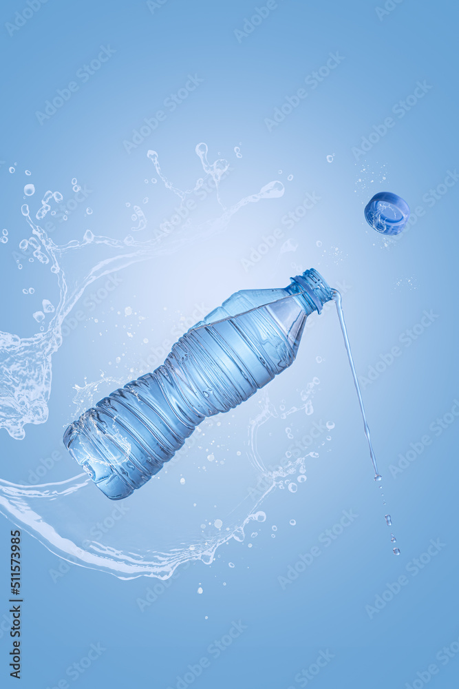 Flying bottle of mineral water with splash on blue background with copyspace and vertical format. Pure water levitation concept. Flying bottle of mineral water with splash on blue background with copyspace and vertical format. Pure water levitation concept.