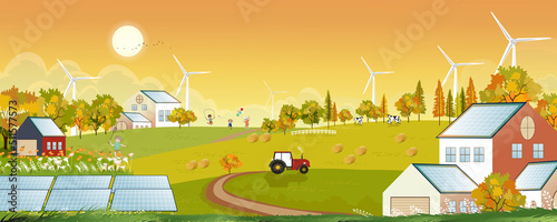 Autumn landscape with Solar panels wind turbines installed as renewable station an energy sources for electricity and power supply.Environmental friendly energy.Solar farm in sunset on Countryside