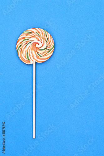 Lollipop on blue background