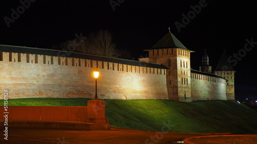Historical monument. The walls and towers are made of red brick. Night photo of the Novgorod Kremlin 