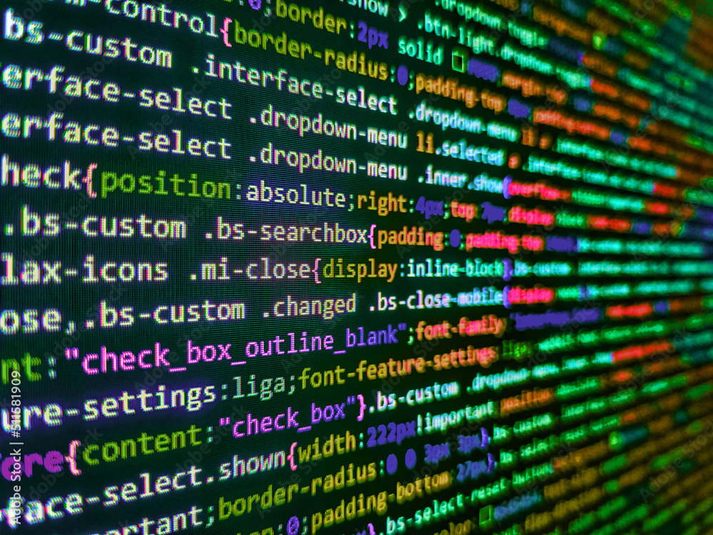 Simple website HTML code with colorful tags in browser view on dark ...