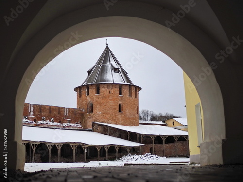 Historical landmark. View through the arch to the tower of the Novgorod Kremlin. Veliky Novgorod, Russia. photo