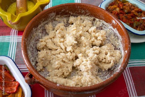 Slika na platnu "Las Gachas" are a dish that is made by cooking wheat or corn flour, and are accompanied with fried food and alioli sauce, a typical recipe from Rincón de Ademuz, Valencia, Spain