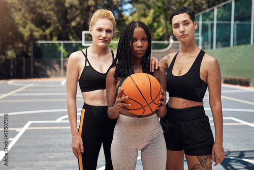 Winners dont wait for chances, they take them. Portrait of a group of sporty young women standing together on a sports court.