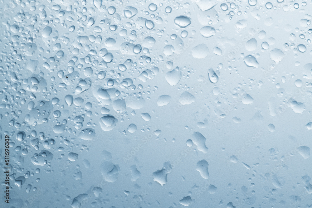 water drops on blue wet matte transparent surface with drops water drops on blue wet matte transparent surface with drops