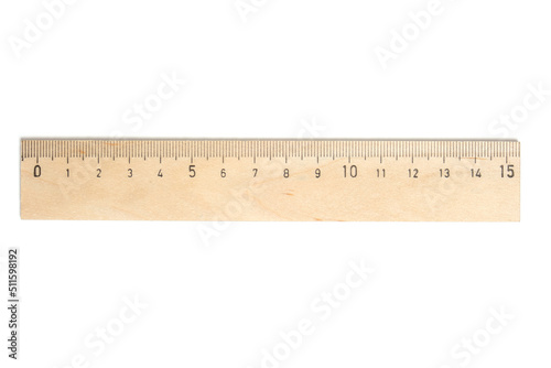 Wooden school ruler on a white background isolate.