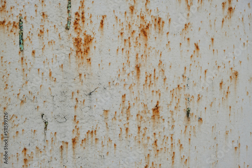 Old sheet of metal with rusty streaks.