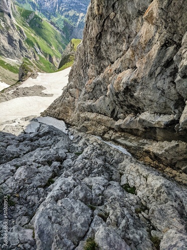 climbing in the east wall channel on the wildhuser schofberg. wanderlust. Hiking in the Alpstein area. High quality photo photo