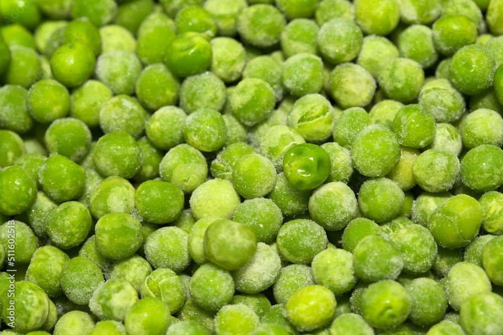 Partially defrosted frozen peas, macro food background
Partially defrosted frozen peas, macro food background
