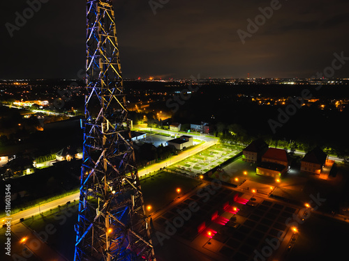 Radio station in Gliwice on night. The largest wooden tower in the world. The historic tower in Gliwice, aerial view.