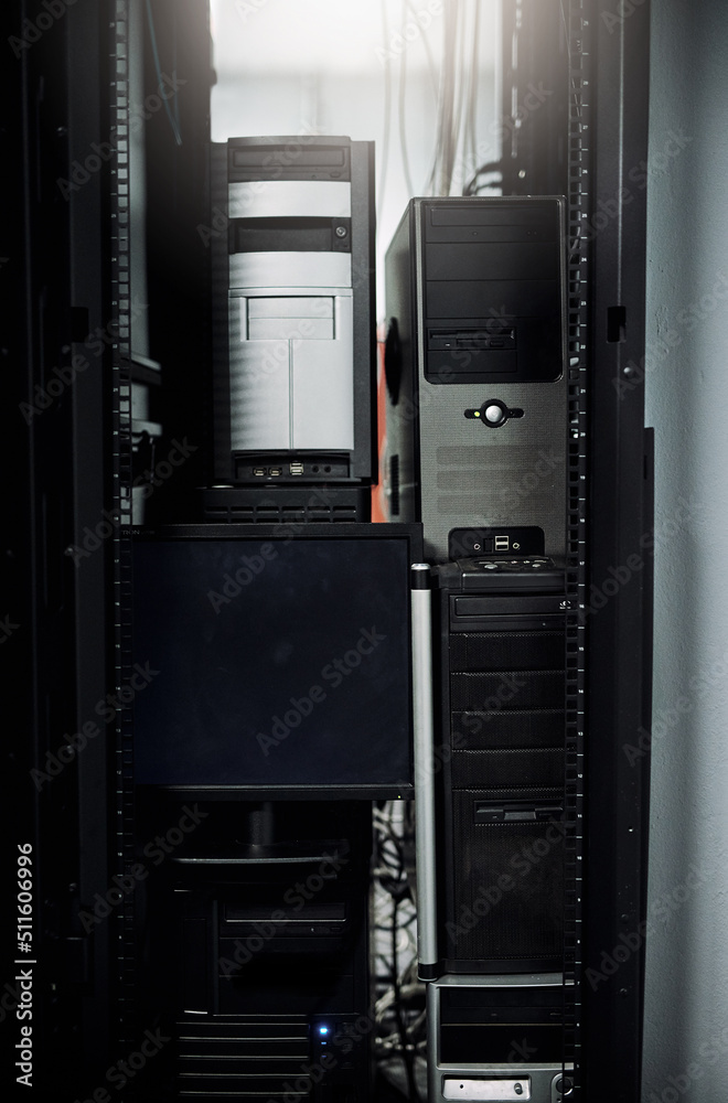 The hardware behind a solid computer network. Cropped shot of industrial computers in the server room of a data center. The hardware behind a solid computer network. Cropped shot of industrial computers in the server room of a data center.