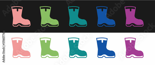 Set Fishing boots icon isolated on black and white background. Waterproof rubber boot. Gumboots for rainy weather, fishing, hunter, gardening. Vector