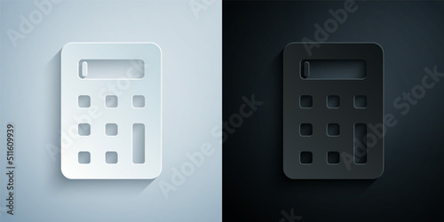 Paper cut Calculator icon isolated on grey and black background. Accounting symbol. Business calculations mathematics education and finance. Paper art style. Vector