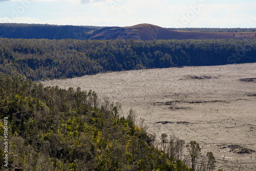 Flat lava rock surface in the crater of the Kilauea volcano in the Hawaiian Volcanoes National Park on the Big Island of Hawai'i in the Pacific Ocean