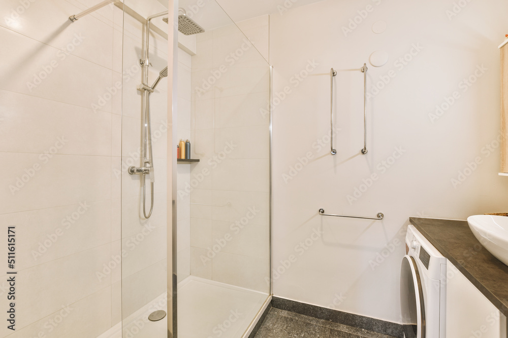 Modern shower stall in a bright bathroom Stock Photo | Adobe Stock