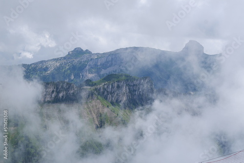 swiss alps in the fog