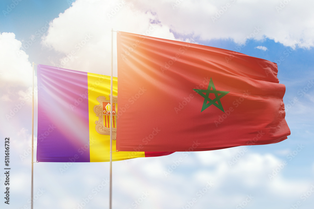 Obraz na płótnie Sunny blue sky and flags of morocco and andorra w salonie