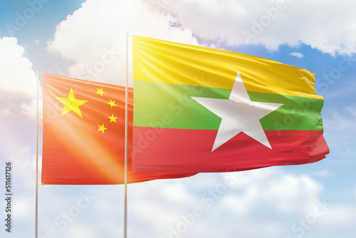 Photography Sunny blue sky and flags of myanmar and china