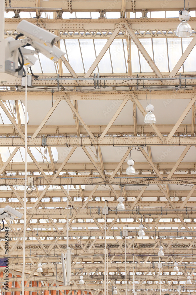 Metal structure of a white ceiling seen from below in the interior Metal structure of a white ceiling seen from below in the interior