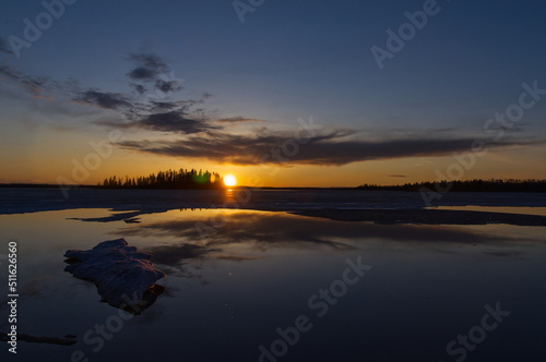 Beautiful Sunset over a Partially Frozen Astotin Lake