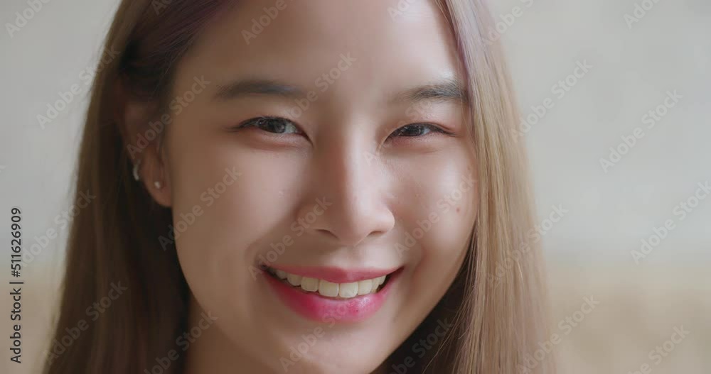 Attractive pretty asian woman smiling with confident and happy emotion. Close up Face portrait of young beautiful charming female looking to camera. People casual leisure, Beauty lifestyle. Attractive pretty asian woman smiling with confident and happy emotion. Close up Face portrait of young beautiful charming female looking to camera. People casual leisure, Beauty lifestyle.