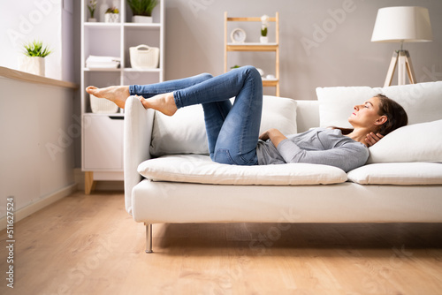 Woman Lying On Sofa