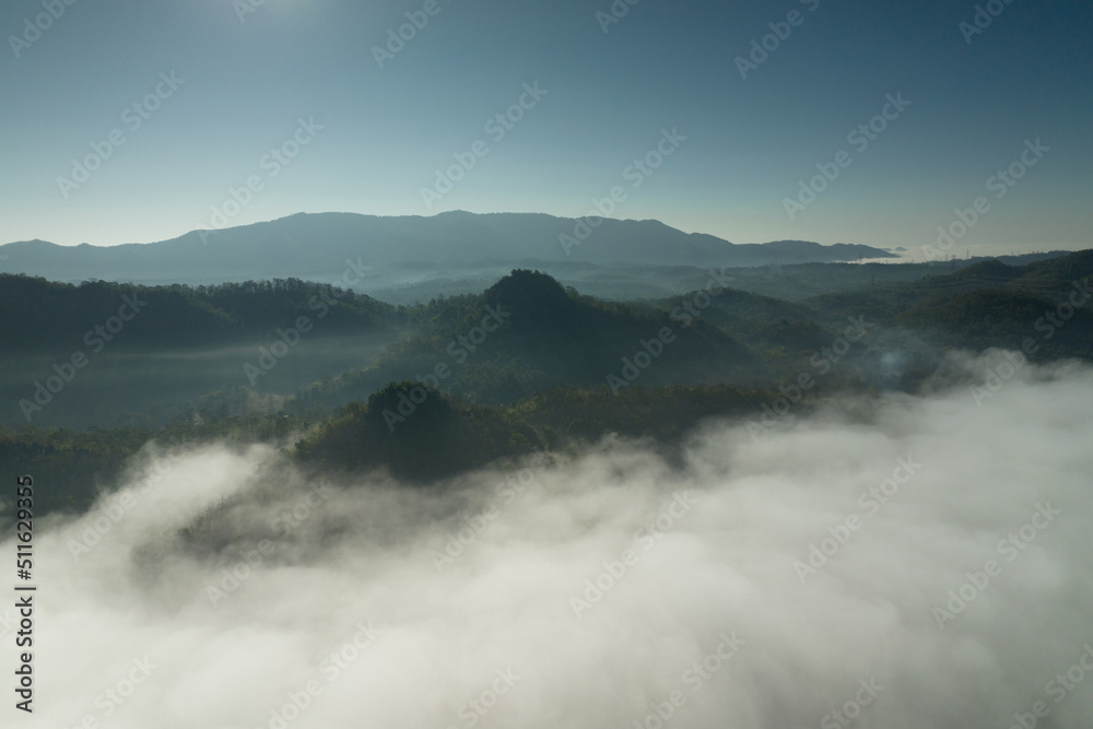 Fog in the morning forest with green mountains. Pang Puai, Mae Moh, Lampang, Thailand. Fog in the morning forest with green mountains. Pang Puai, Mae Moh, Lampang, Thailand.