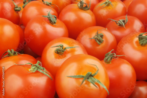 Ripe red tomatoes background or texture.