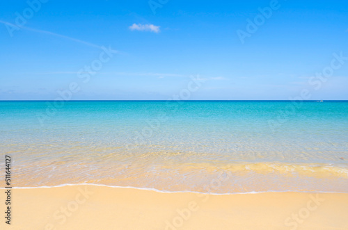 Summer sea season greeting background. Tropical sandy beach with blue ocean and blue sky background image for nature background or summer background in Phuket Thailand