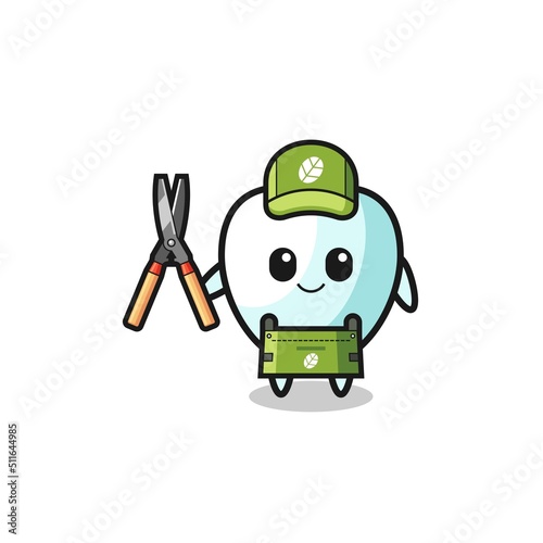 cute tooth as gardener mascot