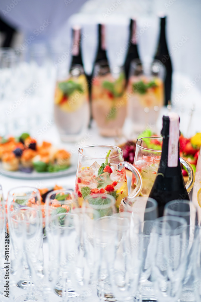champagne and lemonade on the catering table