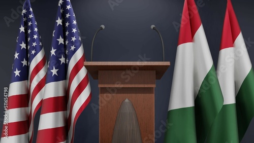 Фотография Flags of USA and Hungary at international meeting or negotiations press conference