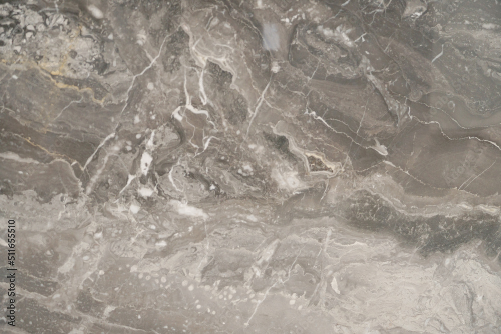Close up of stone slab shows beautiful natural mineral pattern that perhaps flowed in Paleolithic period, resulted in stunning graphic in various forms under the crust. Unique in characters are formed Close up of stone slab shows beautiful natural mineral pattern that perhaps flowed in Paleolithic period, resulted in stunning graphic in various forms under the crust. Unique in characters are formed