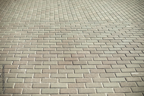 Tiles on square. Details of pedestrian zone.