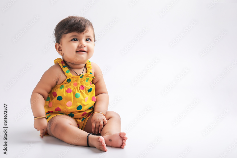 Cute indian baby girl smiling and giving expression. Cute indian baby girl smiling and giving expression.