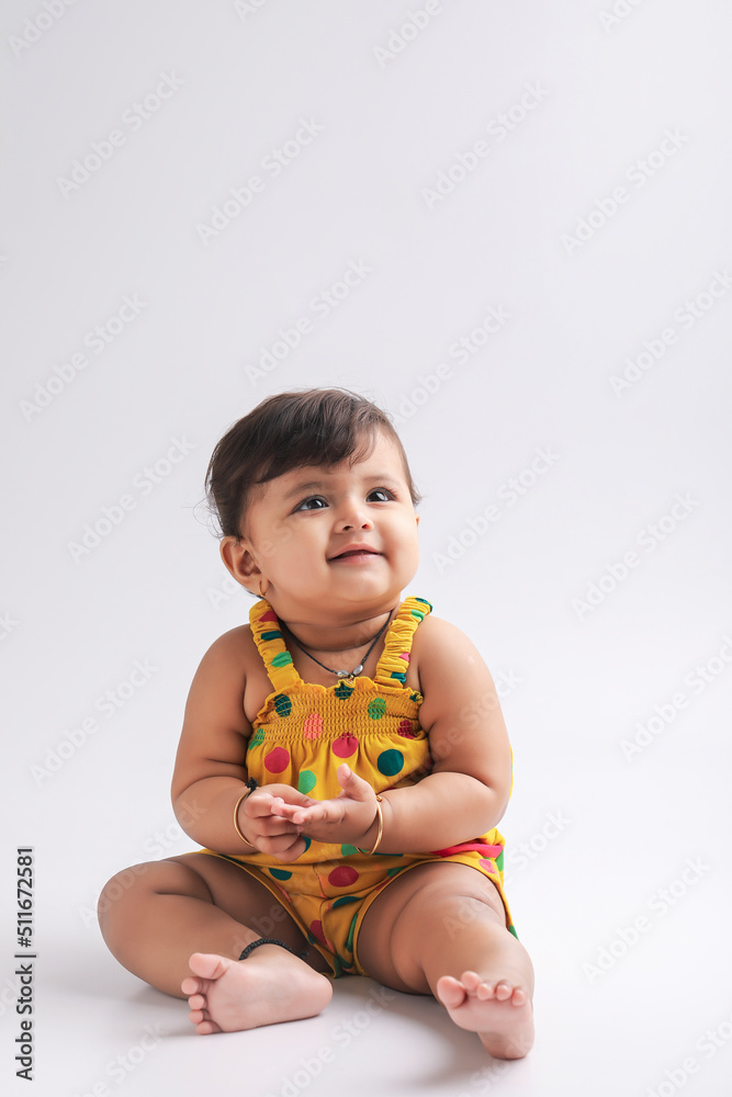Cute indian baby girl smiling and giving expression. Cute indian baby girl smiling and giving expression.