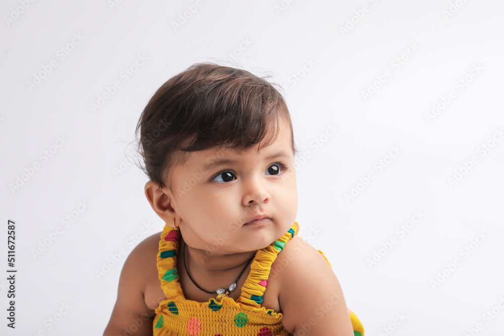Cute indian baby girl smiling and giving expression. Cute indian baby girl smiling and giving expression.
