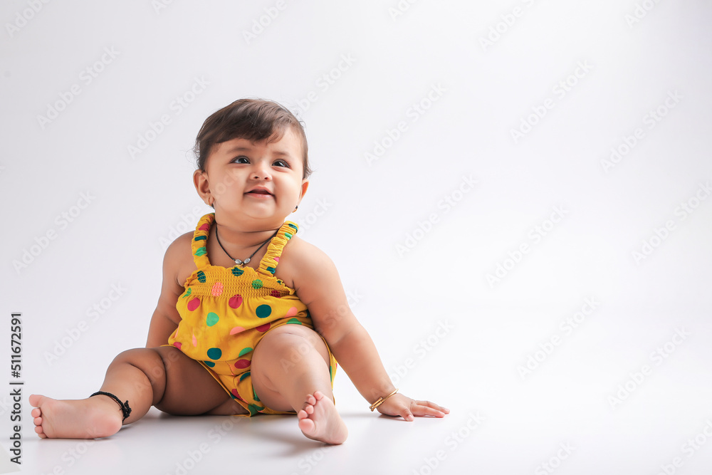 Cute indian baby girl smiling and giving expression. Cute indian baby girl smiling and giving expression.