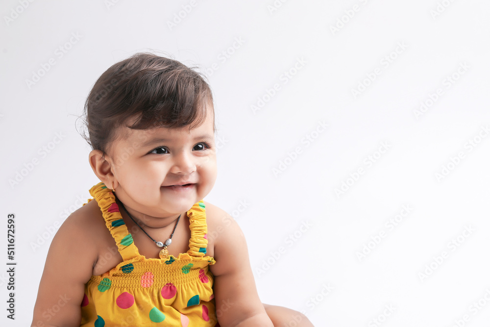 Cute indian baby girl smiling and giving expression. Cute indian baby girl smiling and giving expression.