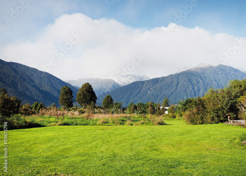 natural scenery, meadows snow covered mountains white cloundy blue sky, New Zealand