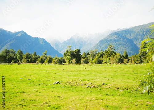 natural scenery, meadows snow covered mountains white cloundy blue sky, New Zealand